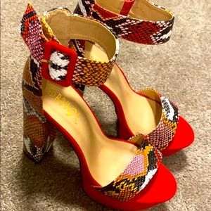 Red Snake print heels